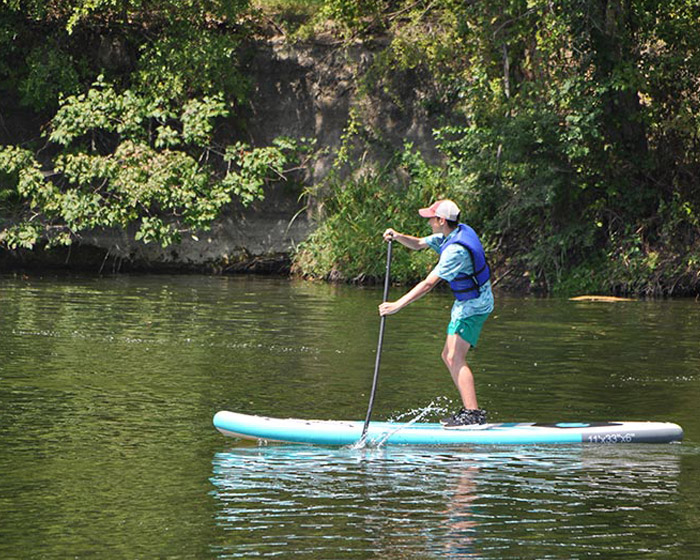 Paddle boat rider at Camp Tahuaya